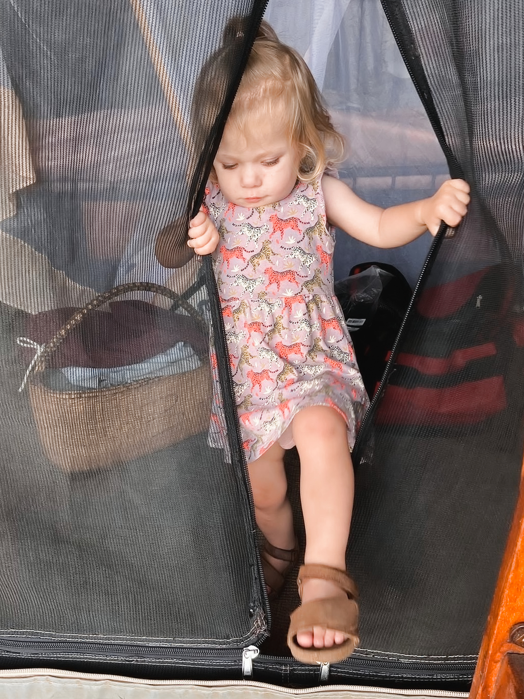 Renske stepping out of the tent at Camp Zebra