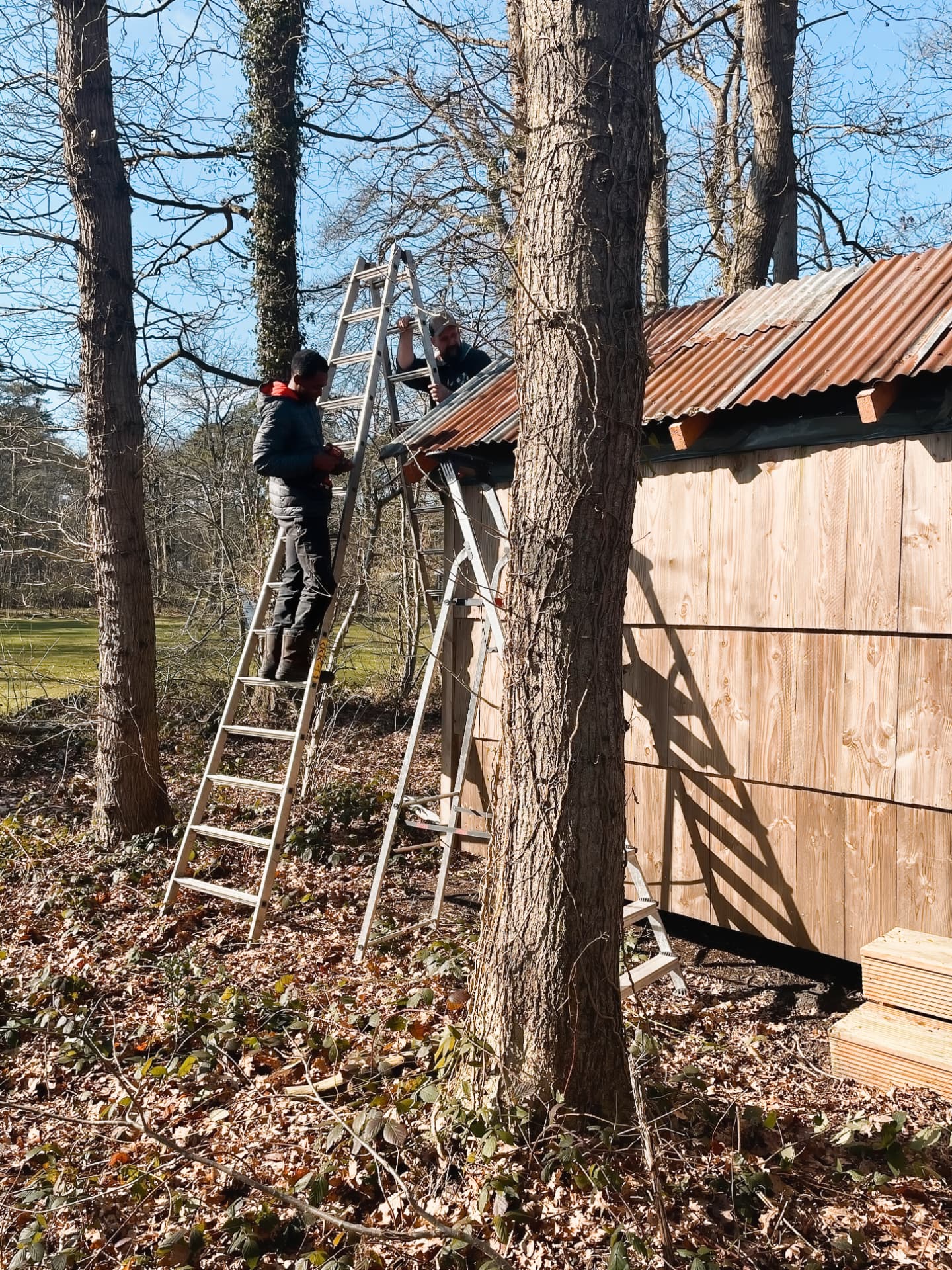 Johnson helping with the cabin roof