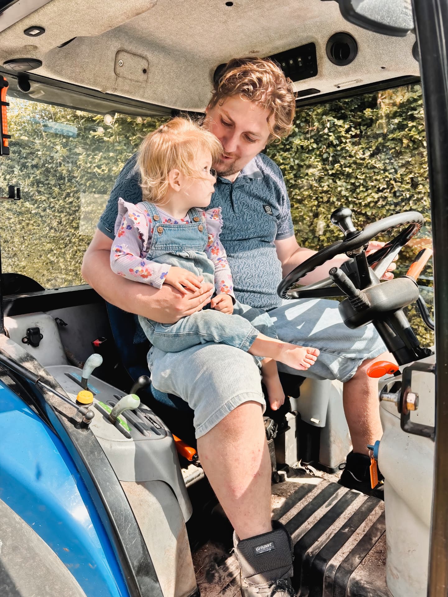 Jaap and Renske in the tractor cab