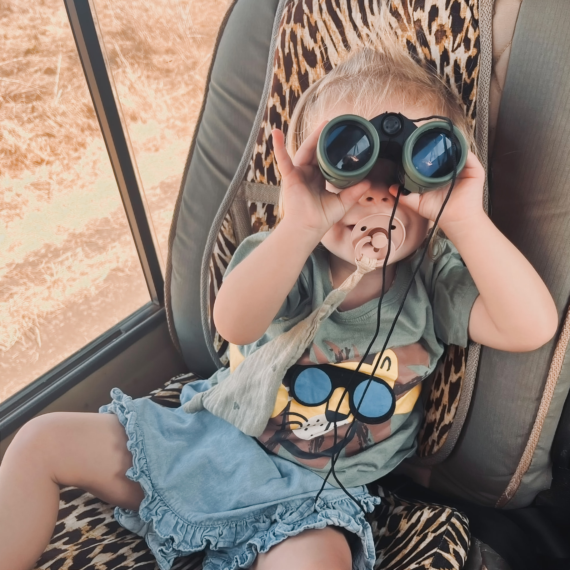 Renske with her binoculars at Ngorongoro